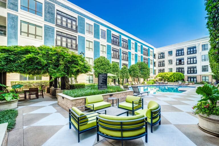 Relax by the pool at the poolside lounge at our luxury apartments in Durham, NC.