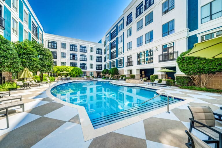 Cool off from the summer heat at our luxury Duke University apartments swimming pool.