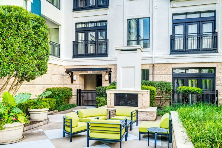 Relax outside by the fireplace at our luxury apartments in Durham, NC.