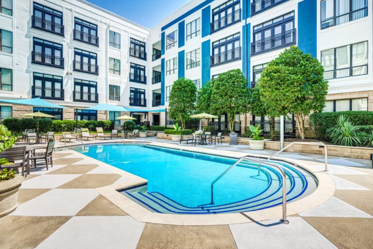 Relax by the resort-style pool at Lofts at Lakeview Apartments near Duke University.