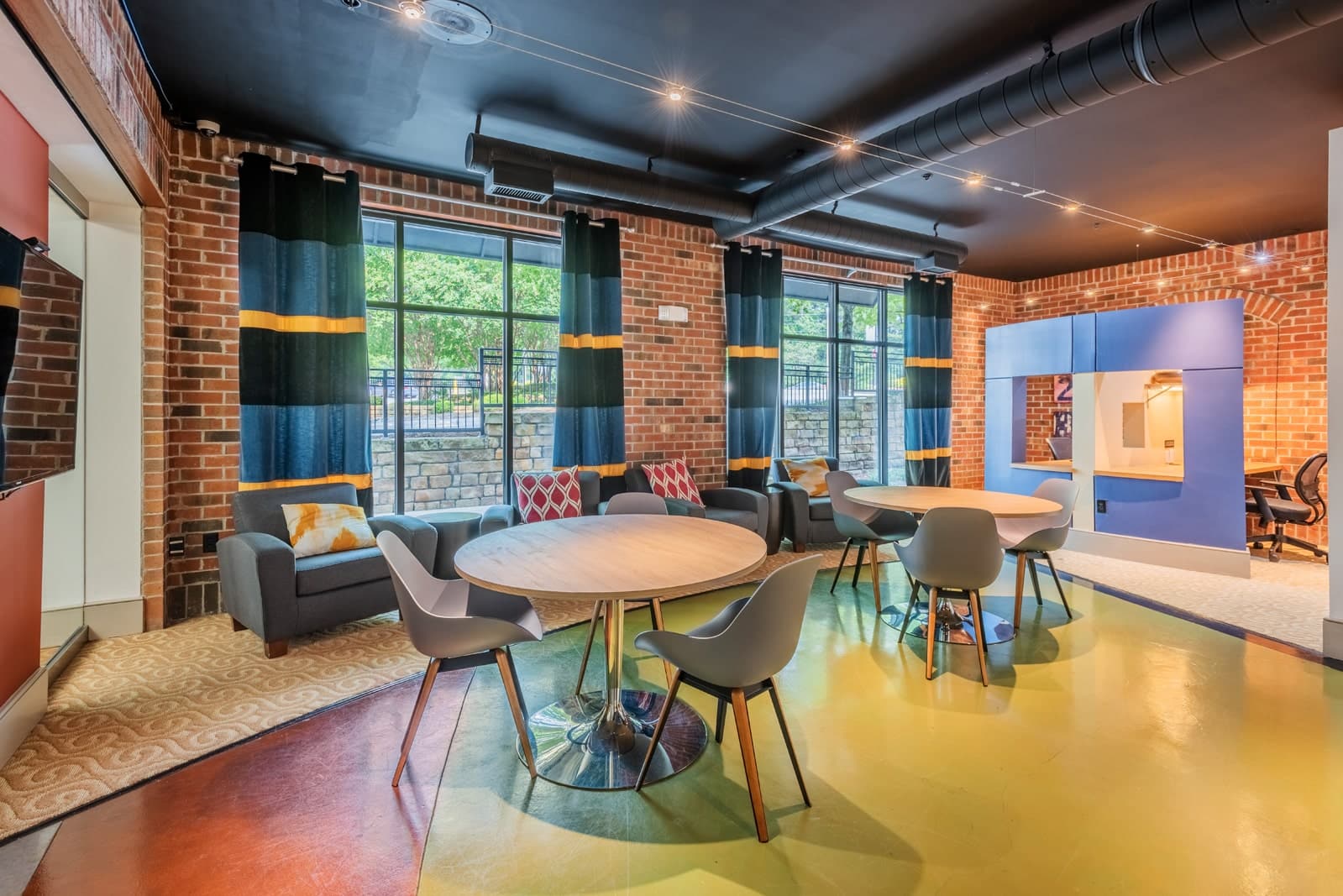 The business center with private study rooms at our Duke University apartments.